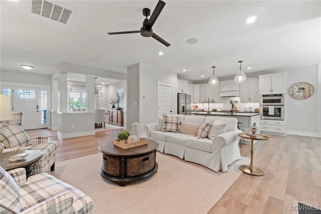 9066 Terroir Ln, New Kent, VA 23124 - living room with a ceiling fan, light wood-type flooring, and recessed lighting