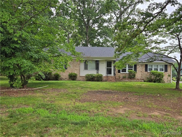 2707 Academy Rd, Powhatan, VA 23139 - single story home featuring brick siding and a front lawn