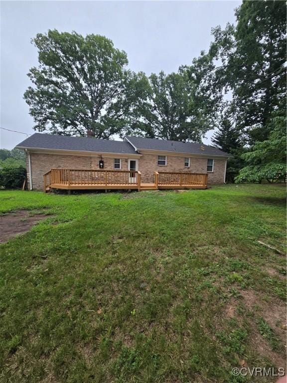2707 Academy Rd, Powhatan, VA 23139 - back of house featuring a wooden deck and a lawn