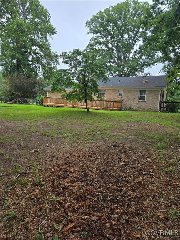 2707 Academy Rd, Powhatan, VA 23139 - view of green lawn featuring a wooden deck