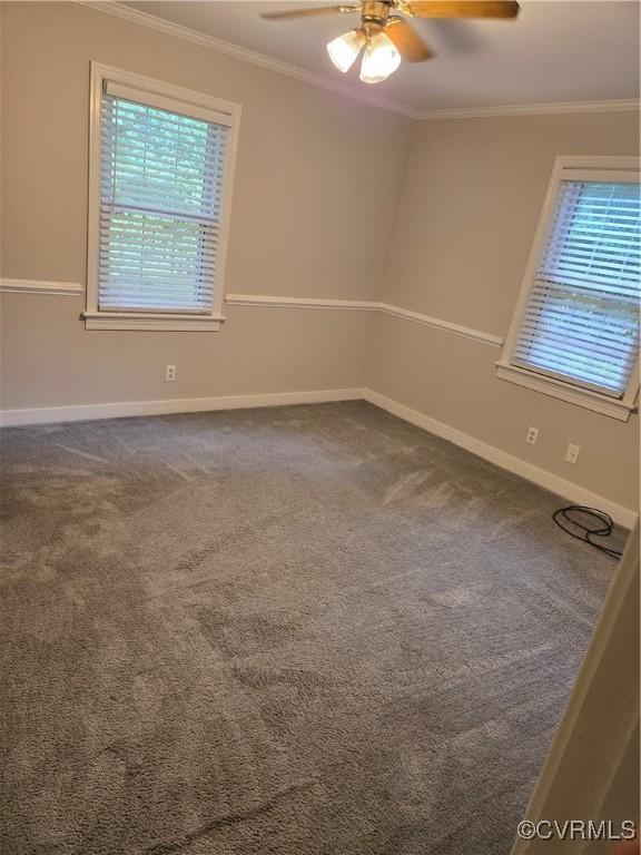 2707 Academy Rd, Powhatan, VA 23139 - empty room with healthy amount of natural light, ornamental molding, a ceiling fan, and carpet flooring