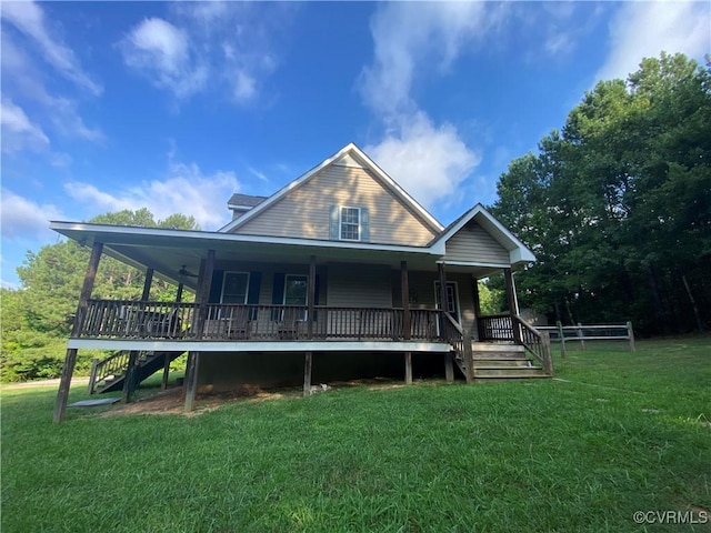 4554 Plank Rd, Kenbridge, VA 23944 - farmhouse-style home with stairway, a front yard, and a porch