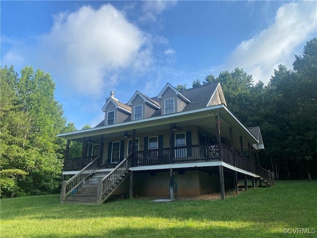 4554 Plank Rd, Kenbridge, VA 23944 - view of front facade with stairway, a ceiling fan, a front lawn, and a porch