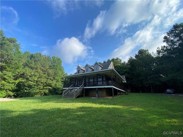4554 Plank Rd, Kenbridge, VA 23944 - back of property with stairway, covered porch, a yard, and a ceiling fan