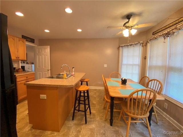 4554 Plank Rd, Kenbridge, VA 23944 - dining room with ceiling fan, recessed lighting, wet bar, and light tile patterned floors