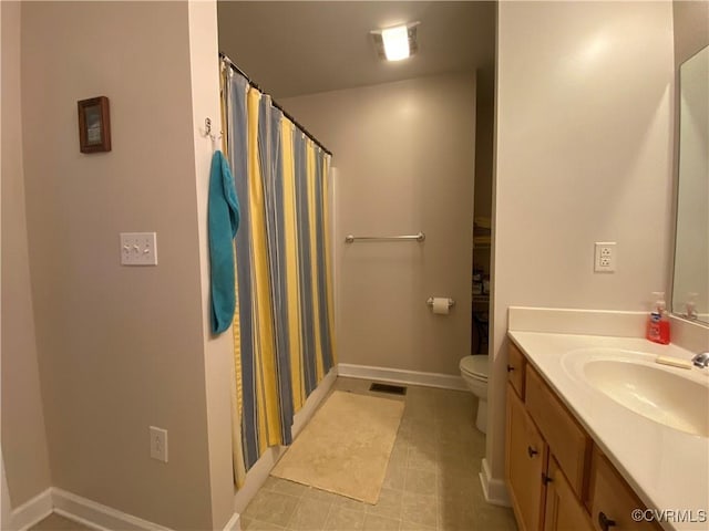 4554 Plank Rd, Kenbridge, VA 23944 - bathroom featuring vanity, tile patterned flooring, and curtained shower