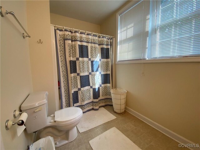 4554 Plank Rd, Kenbridge, VA 23944 - full bathroom with curtained shower and tile patterned floors