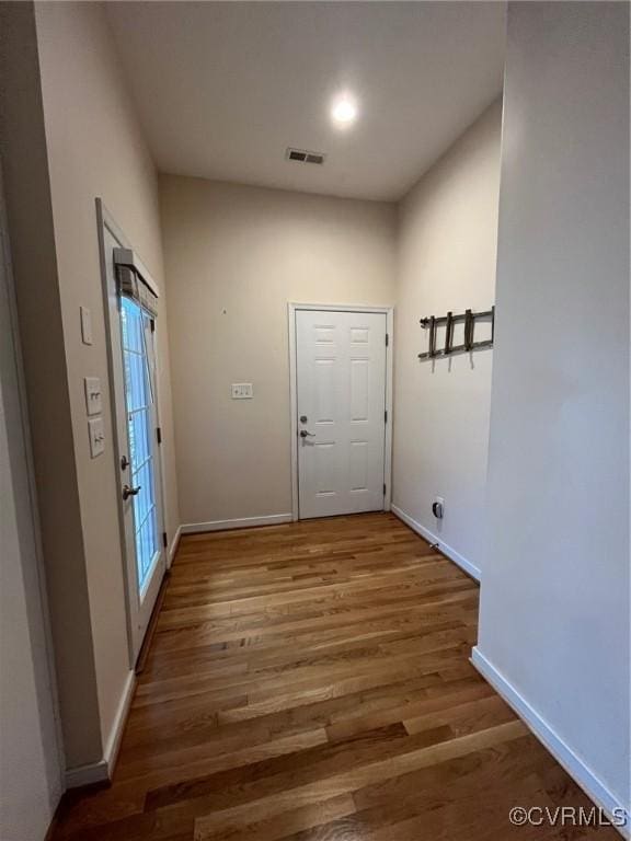 12468 Side Saddle Ln, Ashland, VA 23005 - doorway to outside featuring wood finished floors and baseboards