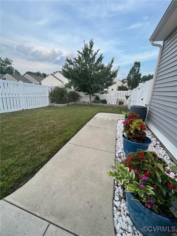 12468 Side Saddle Ln, Ashland, VA 23005 - fenced backyard with a patio area