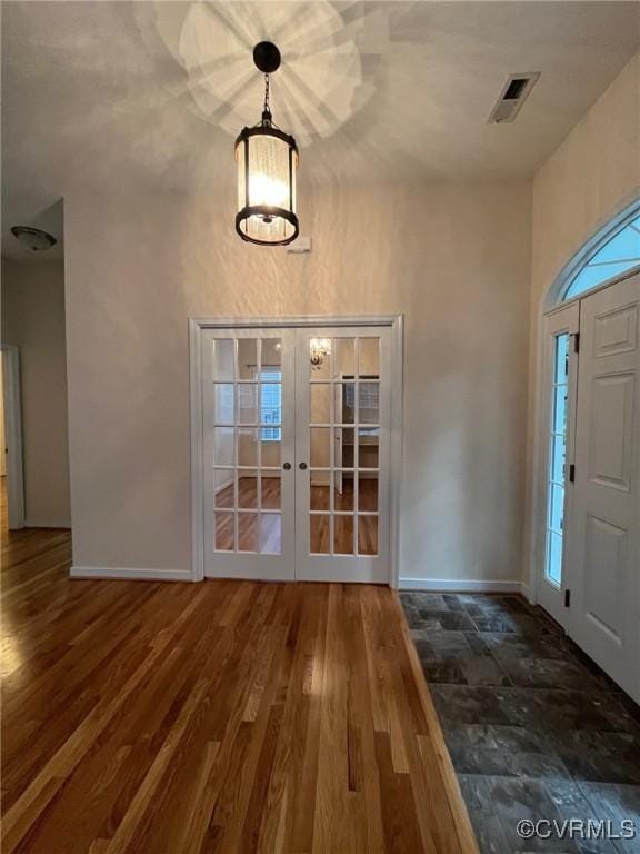 12468 Side Saddle Ln, Ashland, VA 23005 - entrance foyer featuring french doors, wood finished floors, and a high ceiling