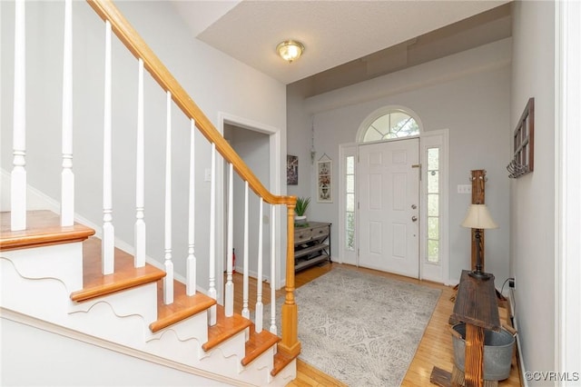 13813 Bluff Ridge Dr, Chesterfield, VA 23838 - entryway with stairs and wood finished floors