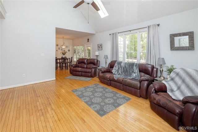 13813 Bluff Ridge Dr, Chesterfield, VA 23838 - living area featuring ceiling fan, wood-type flooring, high vaulted ceiling, and a skylight