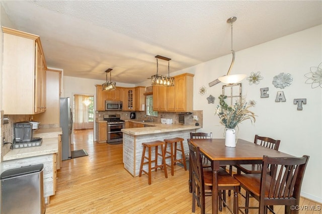 13813 Bluff Ridge Dr, Chesterfield, VA 23838 - dining room with light wood-style flooring