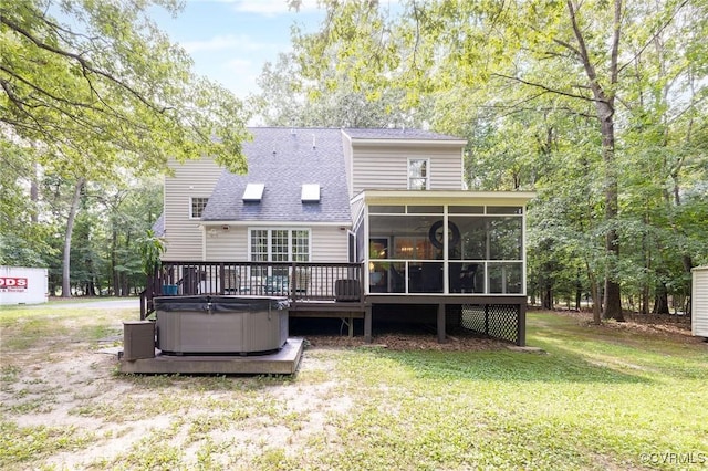 13813 Bluff Ridge Dr, Chesterfield, VA 23838 - rear view of property featuring a hot tub, a sunroom, a yard, a shingled roof, and a wooden deck