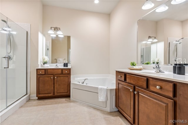 5915 E Stonepath Garden Dr, Chester, VA 23831 - bathroom featuring a shower stall, two vanities, a garden tub, and tile patterned flooring