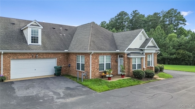 5915 E Stonepath Garden Dr, Chester, VA 23831 - view of front of home with asphalt driveway, brick siding, and a shingled roof