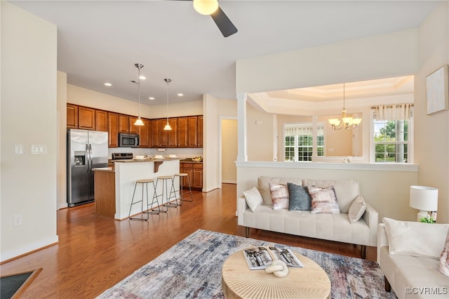 5915 E Stonepath Garden Dr, Chester, VA 23831 - living room with a ceiling fan, a chandelier, dark wood-type flooring, and recessed lighting