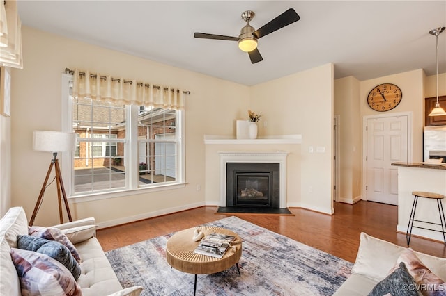 5915 E Stonepath Garden Dr, Chester, VA 23831 - living room with ceiling fan, wood finished floors, and a fireplace with flush hearth