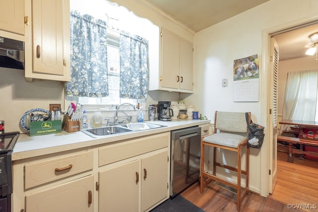 759 Terra Alta Dr, Aylett, VA 23009 - kitchen with dishwasher, wood finished floors, and light countertops