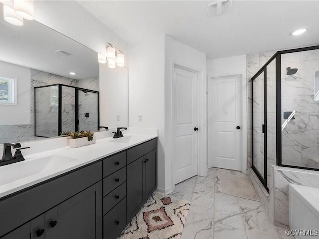 9913 Craftsbury Dr, Midlothian, VA 23112 - full bathroom with marble finish floors, a marble finish shower, double vanity, a garden tub, and recessed lighting