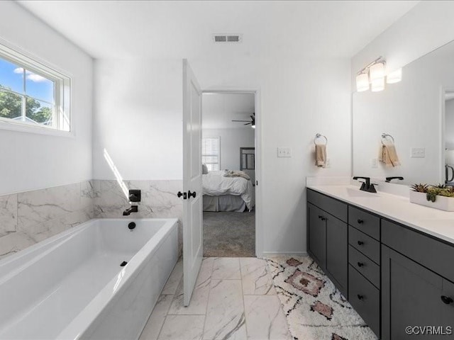9913 Craftsbury Dr, Midlothian, VA 23112 - bathroom with ensuite bath, double vanity, a garden tub, and marble finish flooring