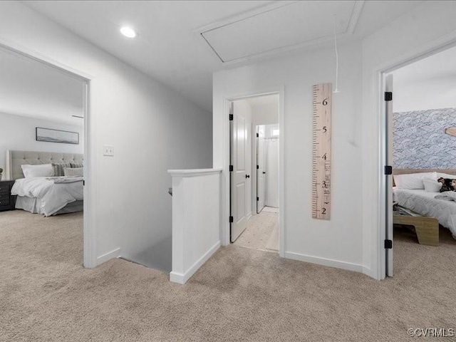 9913 Craftsbury Dr, Midlothian, VA 23112 - corridor featuring attic access, carpet floors, an upstairs landing, and recessed lighting