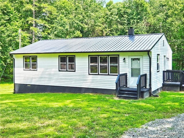 1982 Redd Shop Rd, Farmville, VA 23901 - view of front of home featuring a chimney, crawl space, a standing seam roof, and a front lawn