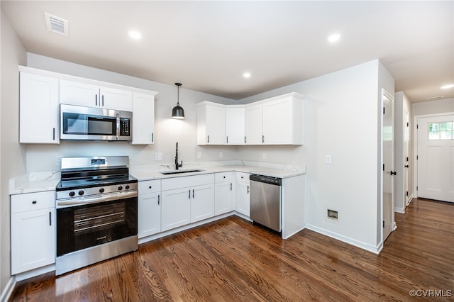 1436 Porters Mill Ter, Chesterfield, VA 23114 - kitchen featuring stainless steel appliances, dark wood finished floors, white cabinets, and recessed lighting