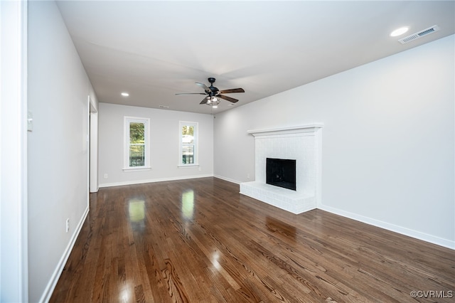 1436 Porters Mill Ter, Chesterfield, VA 23114 - unfurnished living room with ceiling fan, dark wood finished floors, a brick fireplace, and recessed lighting