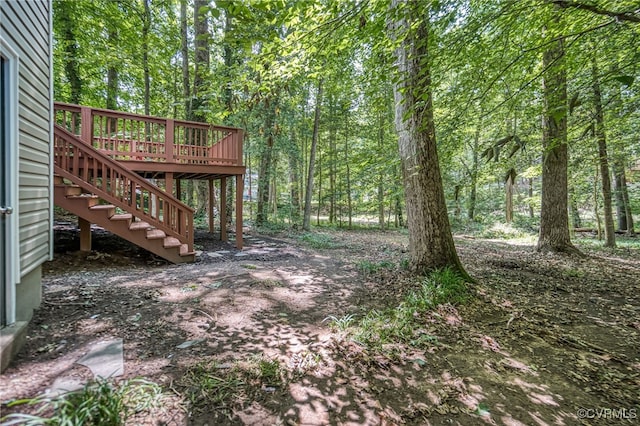 1436 Porters Mill Ter, Chesterfield, VA 23114 - view of yard with stairs, a deck, and a view of trees