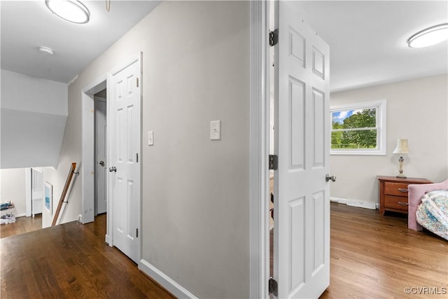 2419 Fon Du Lac Rd, Henrico, VA 23229 - hall featuring an upstairs landing and wood finished floors