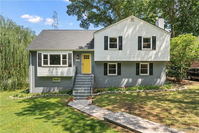 2419 Fon Du Lac Rd, Henrico, VA 23229 - tri-level home with brick siding, a chimney, a front yard, and roof with shingles
