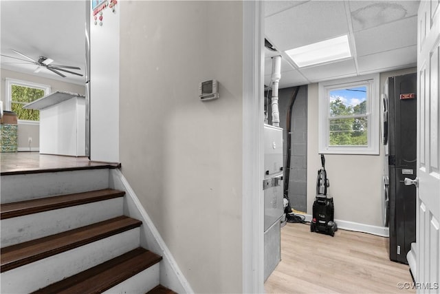 2419 Fon Du Lac Rd, Henrico, VA 23229 - stairway featuring wood finished floors, a ceiling fan, and plenty of natural light