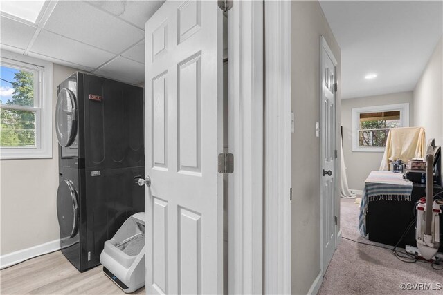 2419 Fon Du Lac Rd, Henrico, VA 23229 - laundry room featuring stacked washer and clothes dryer and light wood finished floors