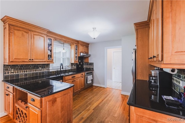 12703 Kelsey Pointe Ct, Chester, VA 23831 - kitchen featuring stainless steel appliances, backsplash, and light wood-style floors
