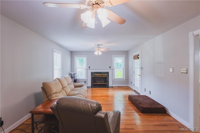 12703 Kelsey Pointe Ct, Chester, VA 23831 - living area featuring a ceiling fan, a high end fireplace, and light wood finished floors
