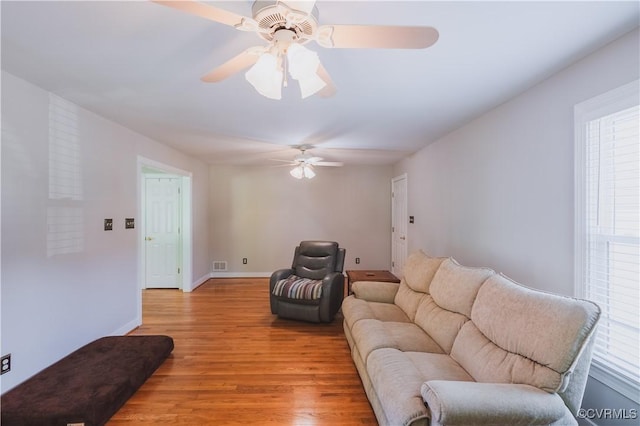 12703 Kelsey Pointe Ct, Chester, VA 23831 - living area with a ceiling fan, light wood-style floors, and plenty of natural light