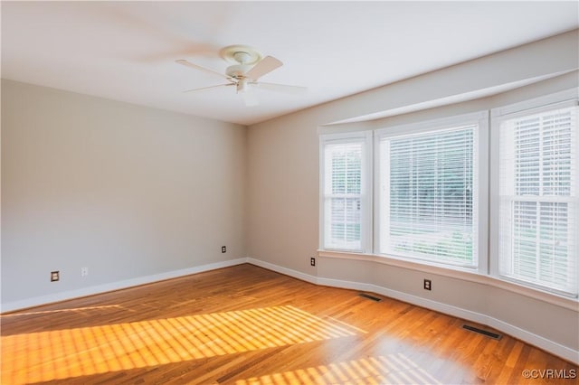12703 Kelsey Pointe Ct, Chester, VA 23831 - spare room with light wood-style flooring and ceiling fan