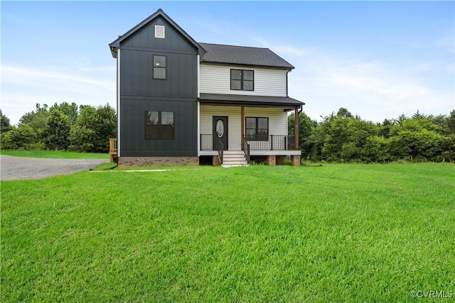 1175 Anderson Hwy, Cumberland, VA 23040 - modern inspired farmhouse featuring covered porch, a front yard, board and batten siding, and a shingled roof