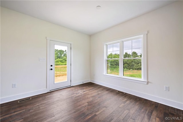 1175 Anderson Hwy, Cumberland, VA 23040 - unfurnished room featuring baseboards and dark wood-style flooring