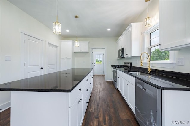 1175 Anderson Hwy, Cumberland, VA 23040 - kitchen with stainless steel appliances, dark countertops, dark wood-style flooring, white cabinetry, and recessed lighting