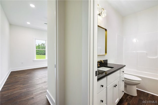 1175 Anderson Hwy, Cumberland, VA 23040 - bathroom featuring vanity, wood finished floors, recessed lighting, and shower / bath combination