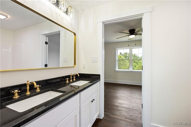 1175 Anderson Hwy, Cumberland, VA 23040 - full bathroom featuring double vanity, wood finished floors, and ceiling fan