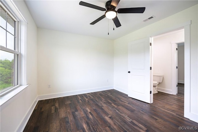 1175 Anderson Hwy, Cumberland, VA 23040 - empty room with healthy amount of natural light, dark wood-style flooring, and a ceiling fan