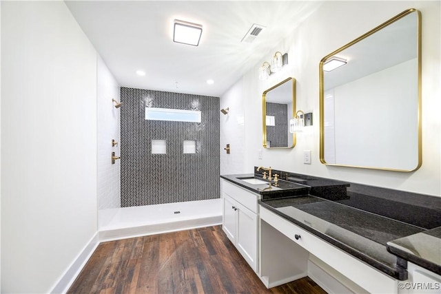 1175 Anderson Hwy, Cumberland, VA 23040 - full bathroom featuring tiled shower, vanity, wood finished floors, and recessed lighting