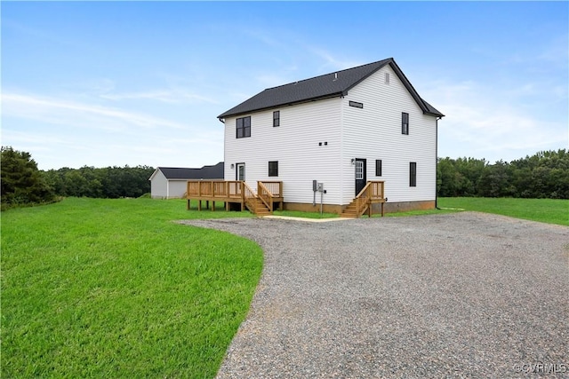 1175 Anderson Hwy, Cumberland, VA 23040 - back of property featuring a lawn and a wooden deck