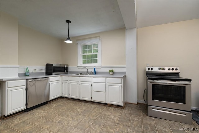 9349 Quinnford Blvd, Chesterfield, VA 23237 - kitchen featuring stainless steel appliances, white cabinets, pendant lighting, and light countertops
