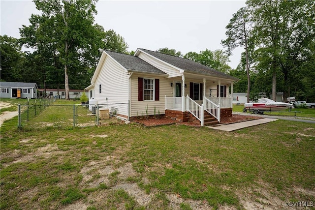 12226 Bristle Cone Ln, Ruther Glen, VA 22546 - ranch-style house featuring a gate, a porch, and roof with shingles