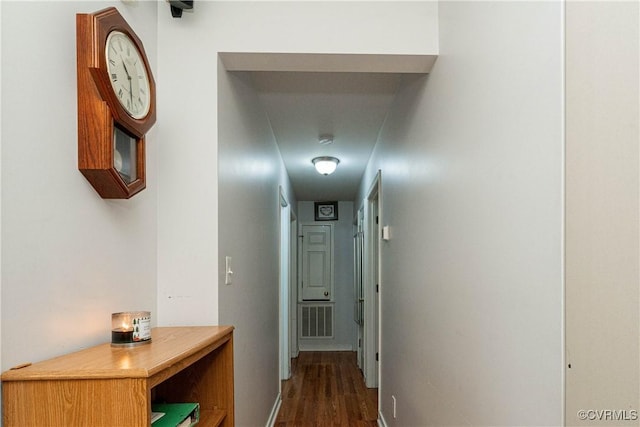 12226 Bristle Cone Ln, Ruther Glen, VA 22546 - hallway featuring dark wood-style flooring and baseboards