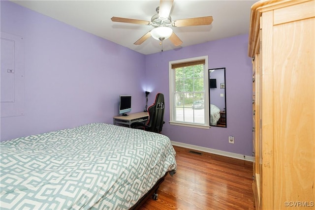 12226 Bristle Cone Ln, Ruther Glen, VA 22546 - bedroom with wood finished floors, electric panel, and ceiling fan